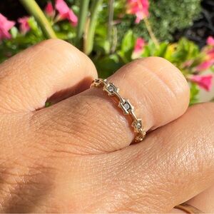 Yellow gold band with diamonds perfect as a stackable